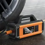 HOCO QS4 utilisé pour ajuster la pression d'un pneu de voiture avec affichage numérique précis