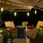 Enceinte XDOBO Party 1981 animation fête jardin extérieur nuit guirlandes lumineuses Algérie